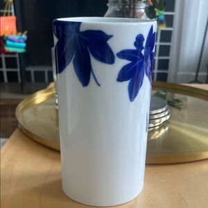 Tiffany Vines vase with blue flowers around